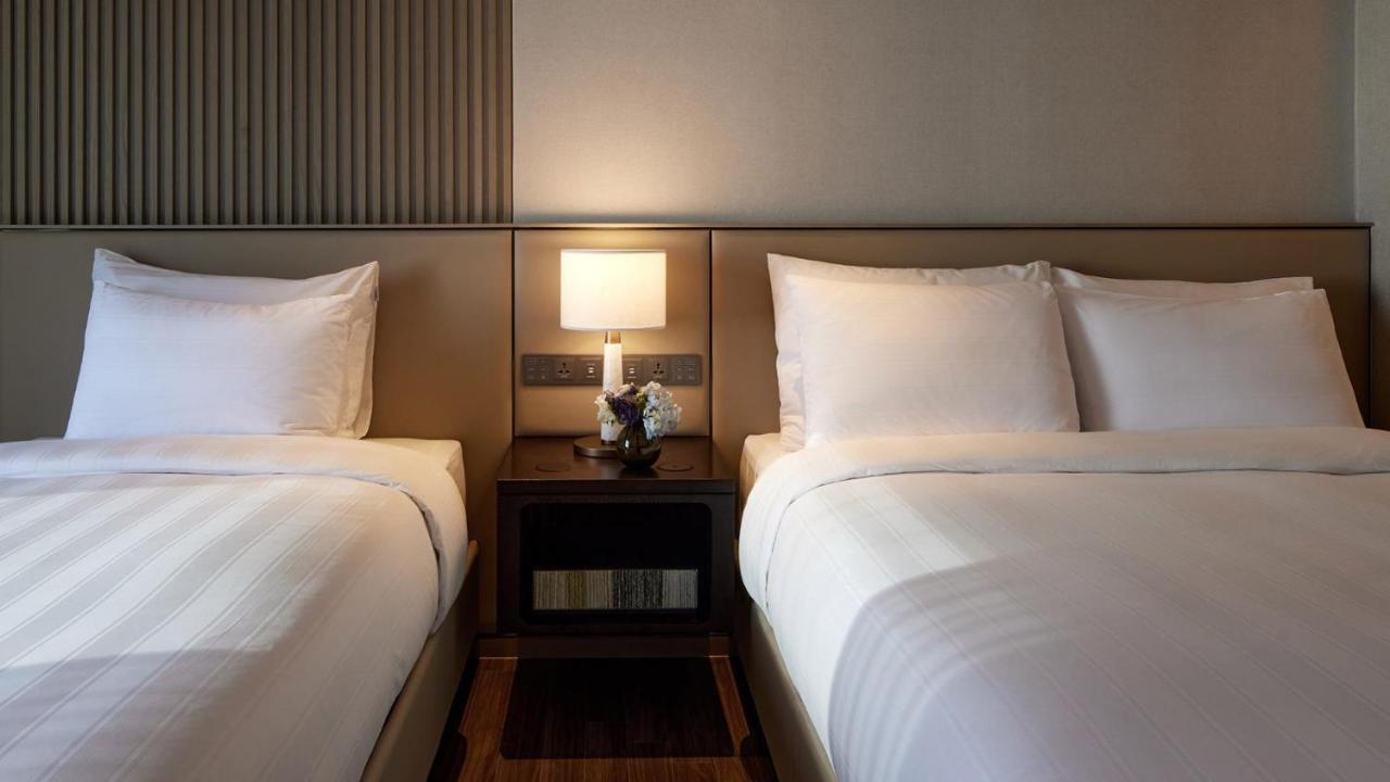 Lotte Hotel World Seoul Exterior photo Deluxe Room